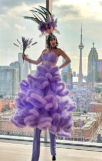 Lavender Lady stiltwalker Hala on Stilts Entertainment Toronto