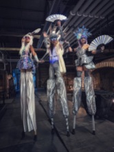 Hala on Stilts Toronto Stilt-walkers Silver festival costumes
